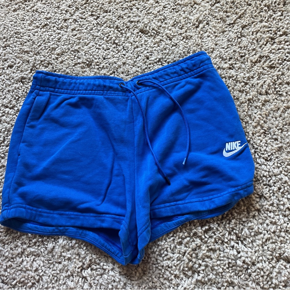 Blue Nike athletic shorts size M
